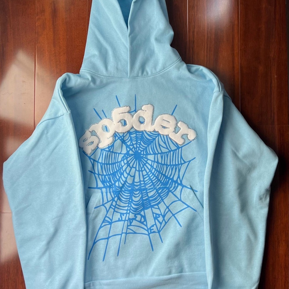 Brand new XL baby blue sp5der hoodie.  Got the wrong size Message me for offers